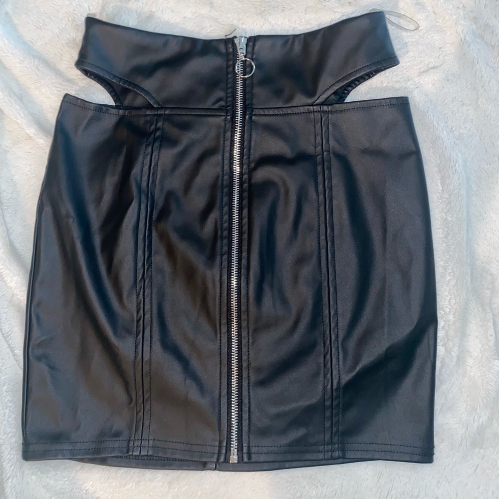 Privy Black leather mini skirt with zipper front. Size small. Worn once.